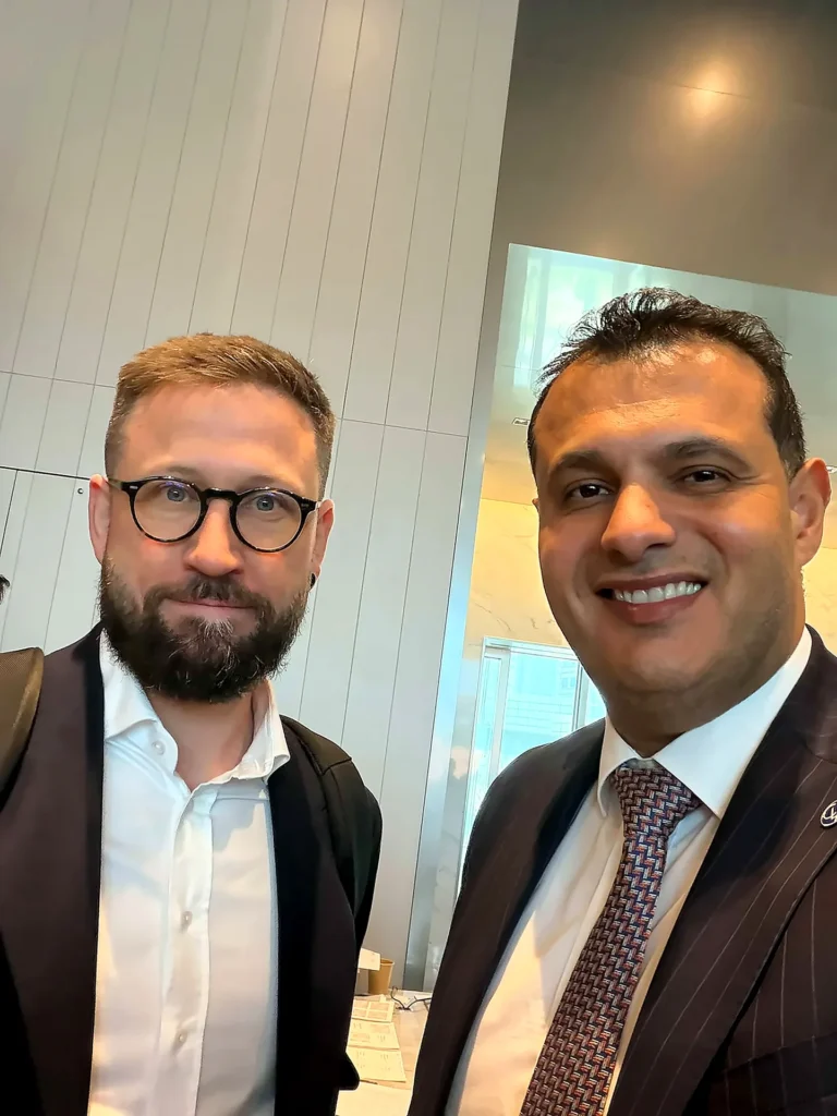 Samer Ali Hasan with a CLA colleague in Singapore