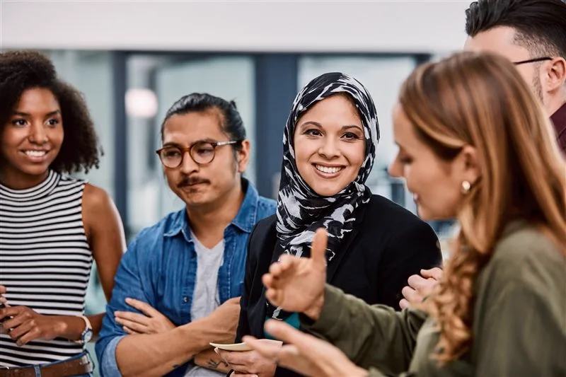 Diverse group of colleagues in discussion