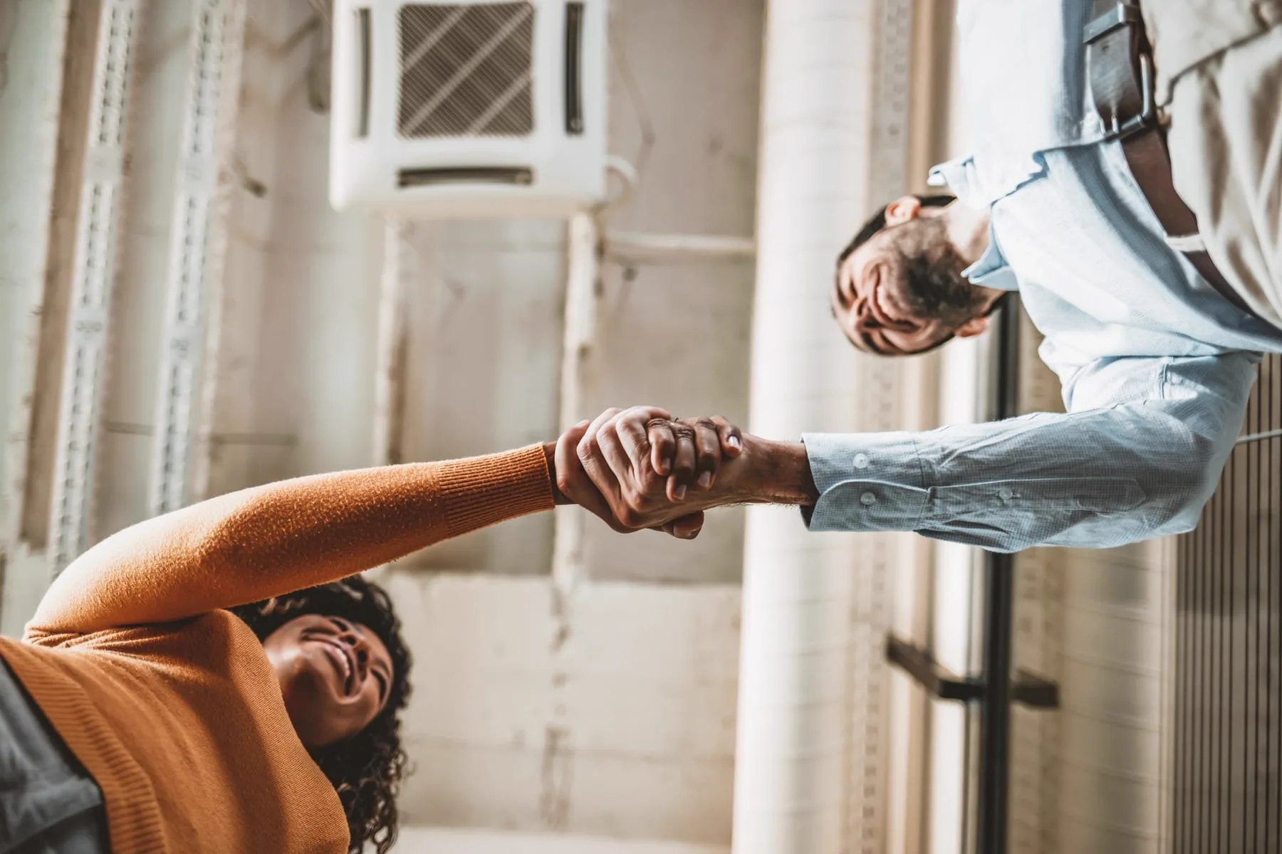 Two colleagues shaking hands